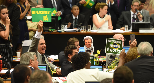 The members of the impeachment committee vote on the fate of Brazilian President Dilma Rousseff at the National Congress in Brasilia on April 11, 2016. A congressional committee on Monday recommended impeachment of Rousseff, setting the stage for a crucial vote in the lower house to decide whether she should face trial. / AFP PHOTO / EVARISTO SA