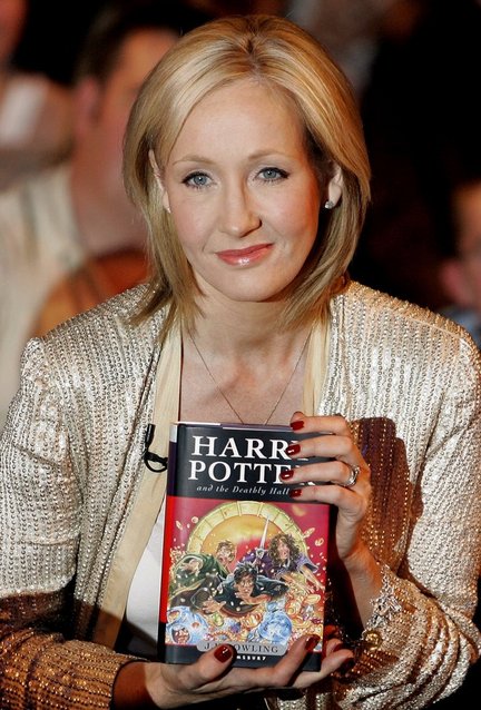 **FILE ** British author J.K. Rowling poses for a photo at the release of her latest Harry Potter book titled "Harry Potter and the Deathly Hallows" at the Natural History Museum in London, in this July 20, 2007 file photo. Rowling is scheduled to testify Monday, April 14, 2008 in a trial that is sure to generate huge interest among Harry Potter fans and the public. (AP Photo/Kirsty Wigglesworth, file)